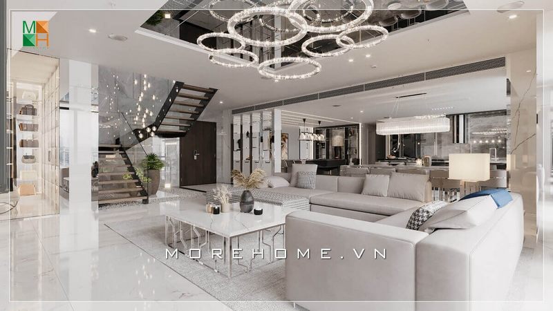 Bàn trà chân sắt mặt đá vân mây trắng kiểu dáng độc đáo làm tăng thêm nét hiện đại trong thiết kế này